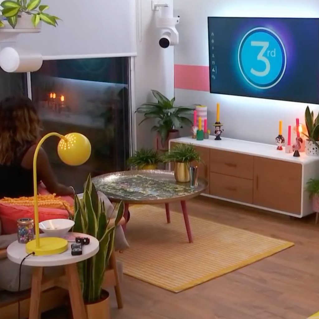 A contestant in her apartment in The Circle